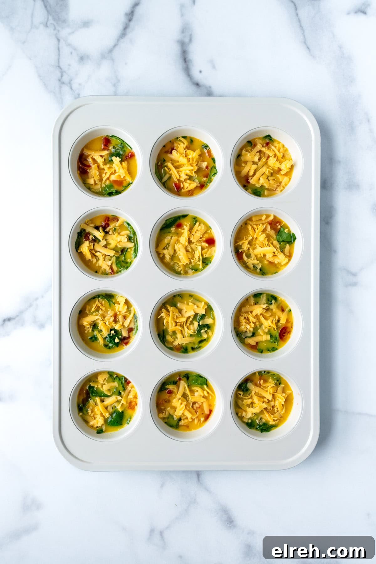 Egg Bites in Muffin Tin Before Baking.