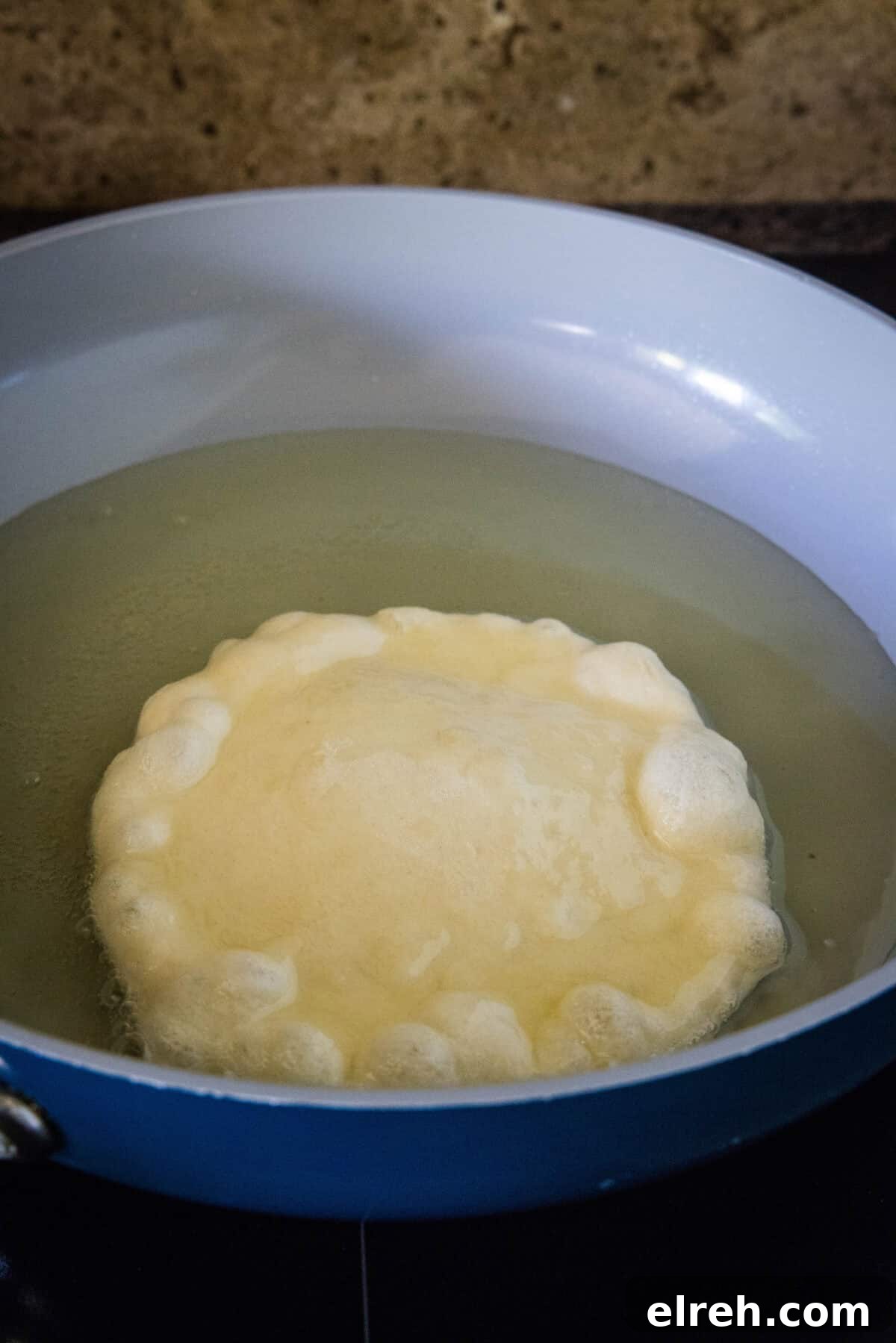 fry bread in a pan with oil