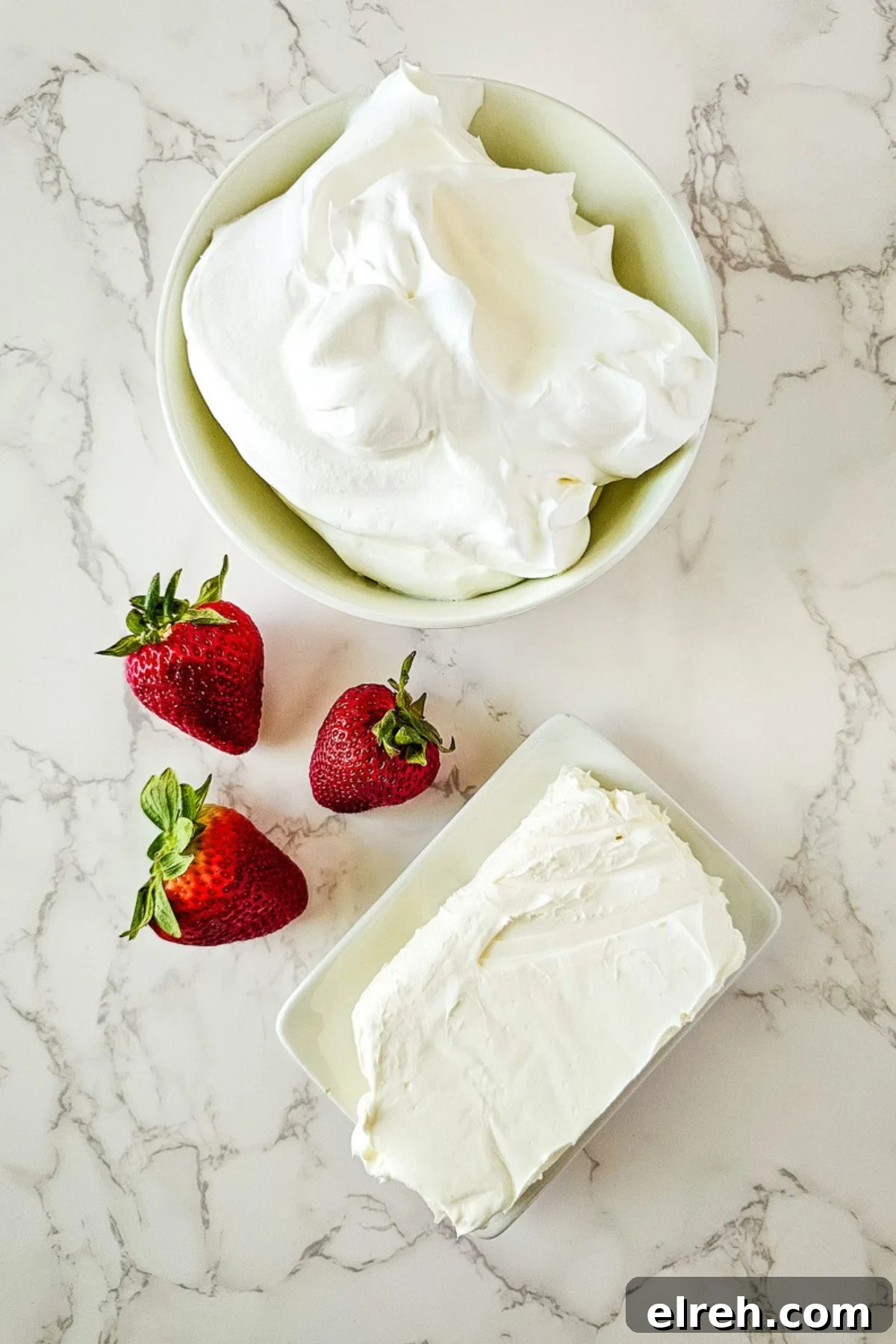 No-Bake Strawberry Cheesecake Dip Recipe 4 Ingredients for strawberry fruit dip laid out in bowls on a counter.