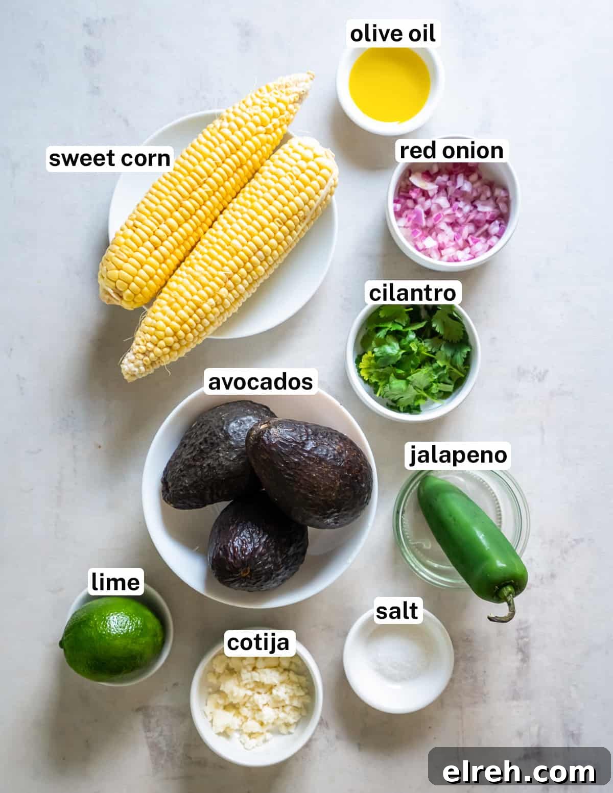 Charred Corn Guacamole Recipe with Lime and Cilantro 4 Corn on the cob and other ingredients for corn guacamole with text.