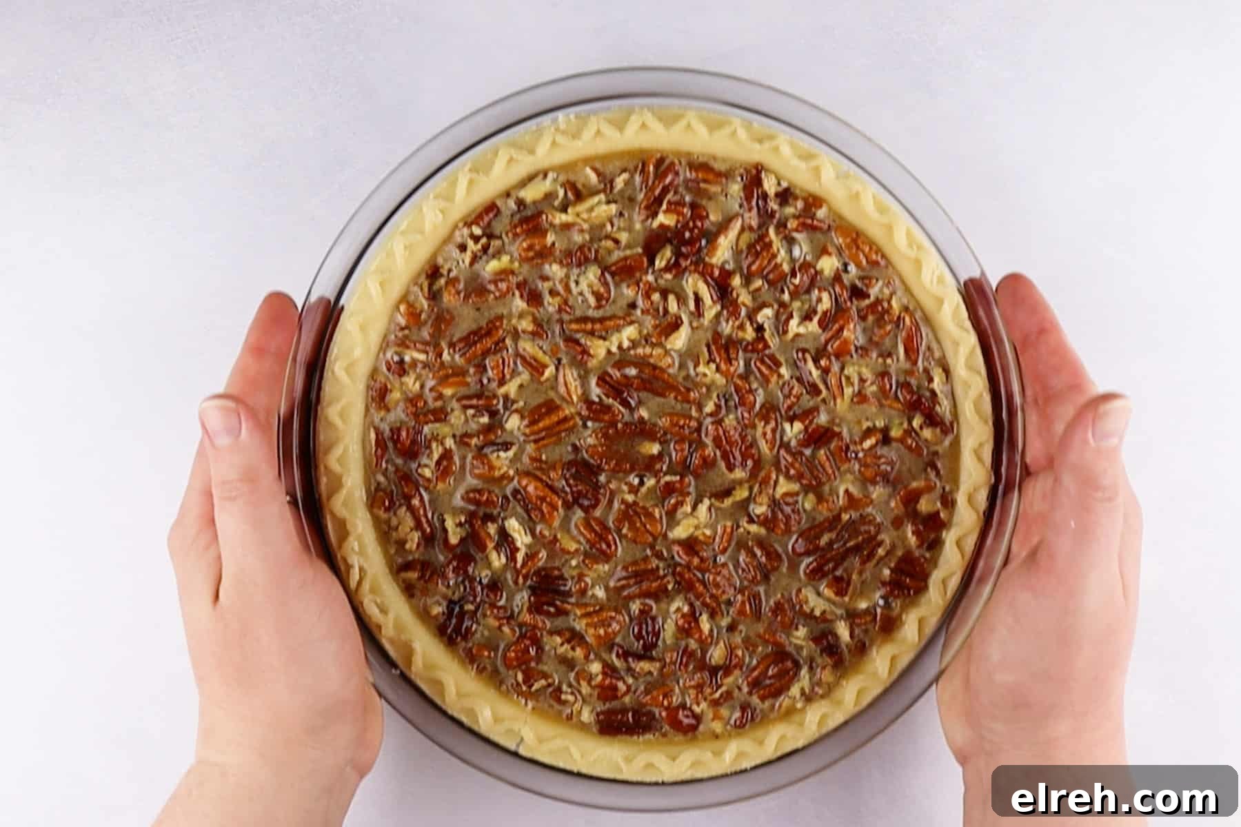 Old Fashioned Pecan Pie Recipe 8 pecan pie filling in crust before baking.