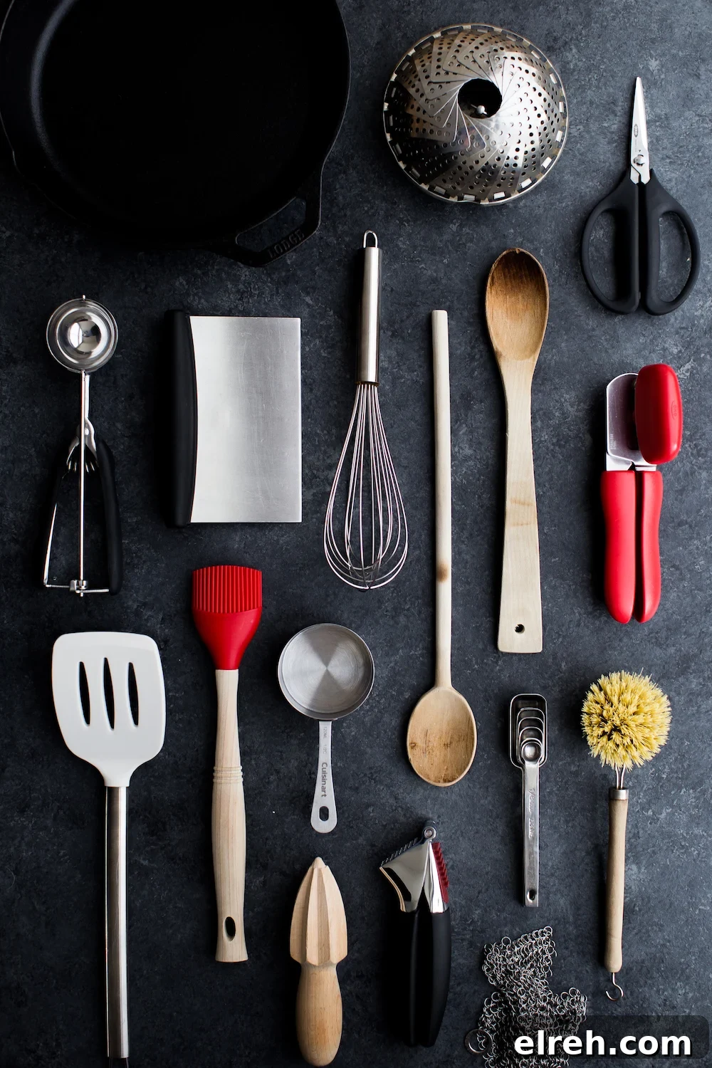 Minimalist kitchen tools on dark background