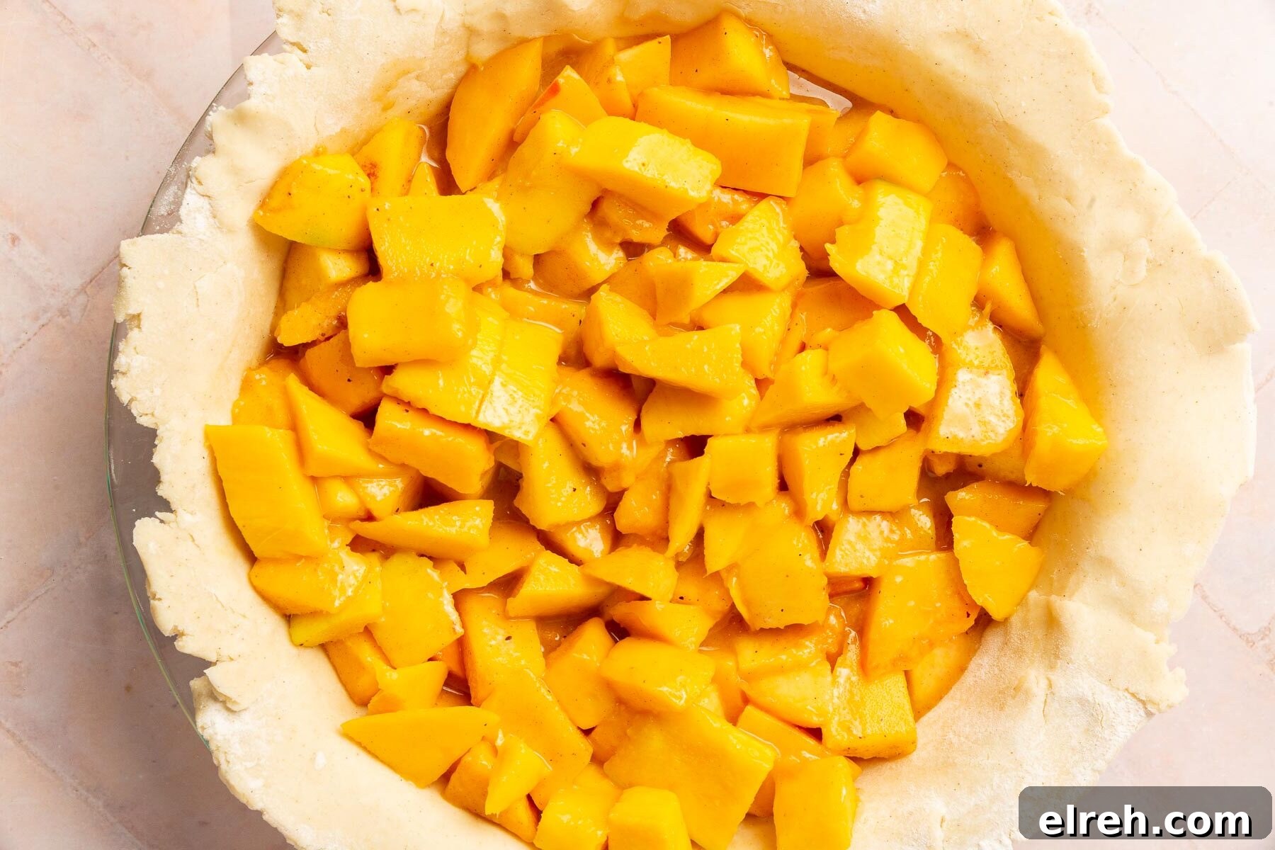 Gluten-Free Peach Mango Pie Recipe 9 Gluten-free pie dough filled with peach mango pie filling before adding the top crust.