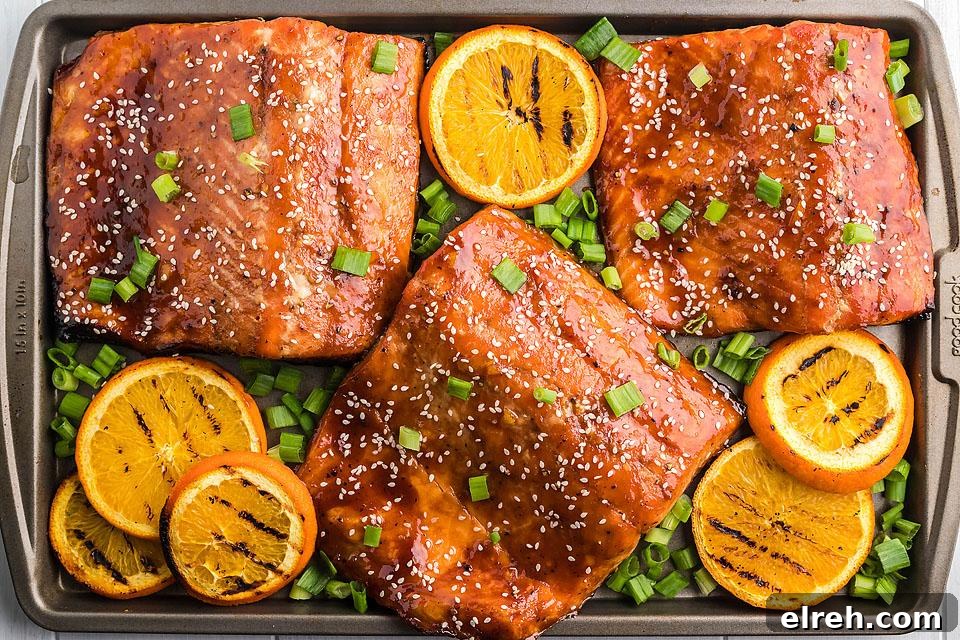 50 July Recipes to Cook This Summer 11 Salmon on a tray with oranges.