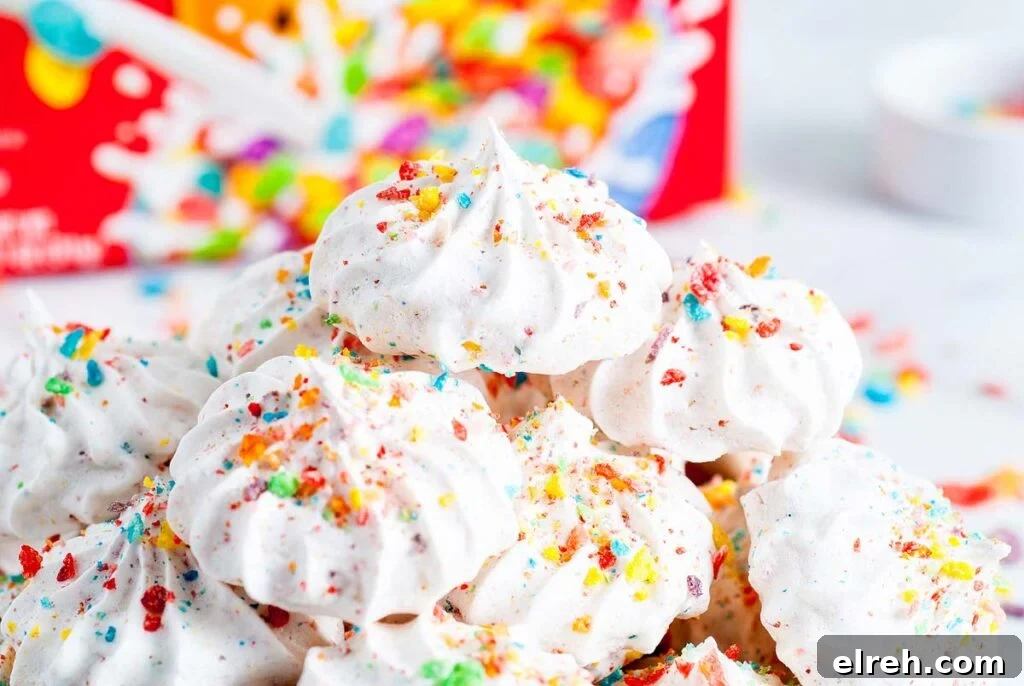 50 July Recipes to Cook This Summer 18 A stack of meringue cookies made with Fruity Pebbles cereal.