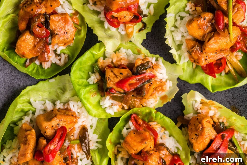 50 July Recipes to Cook This Summer 21 Spicy gochujang chicken stir fry served on lettuce leaves.