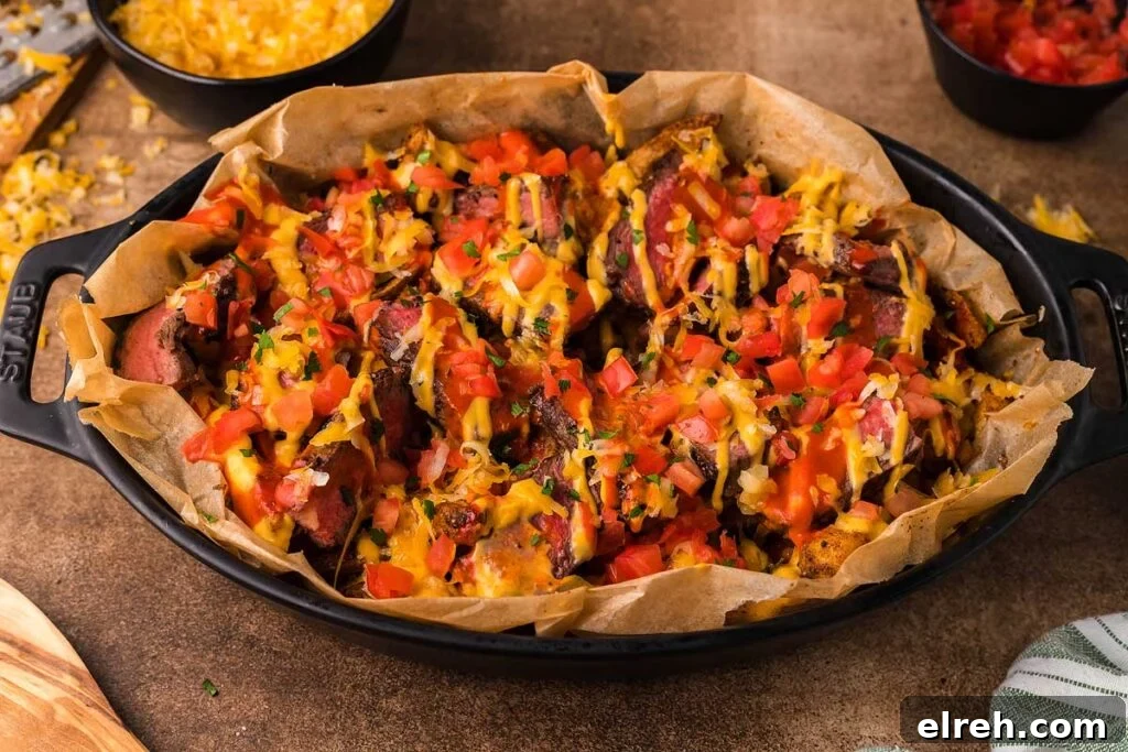 50 July Recipes to Cook This Summer 28 A casserole dish with steak loaded fries.