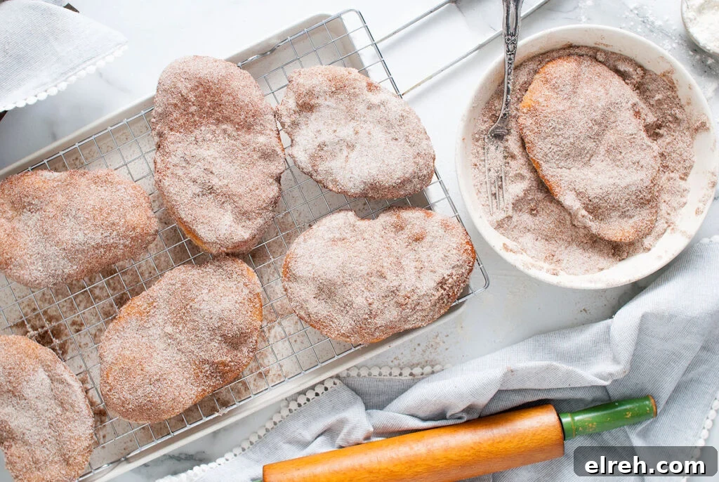 50 July Recipes to Cook This Summer 31 A wire tray with several homemade beaver tails on it.
