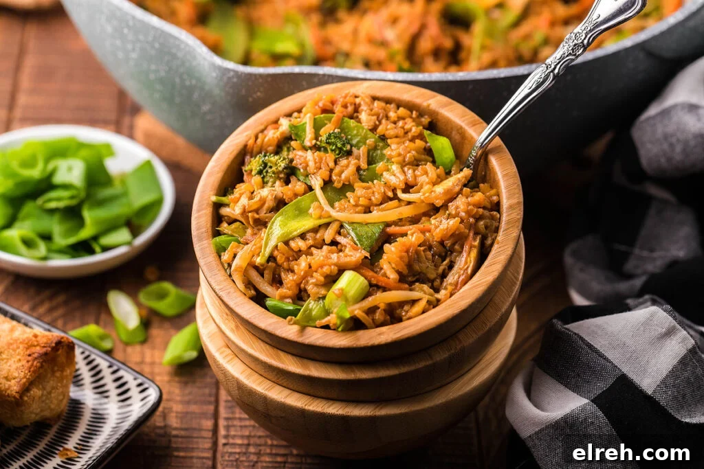 50 July Recipes to Cook This Summer 33 Homemade fried rice in wood bowls.
