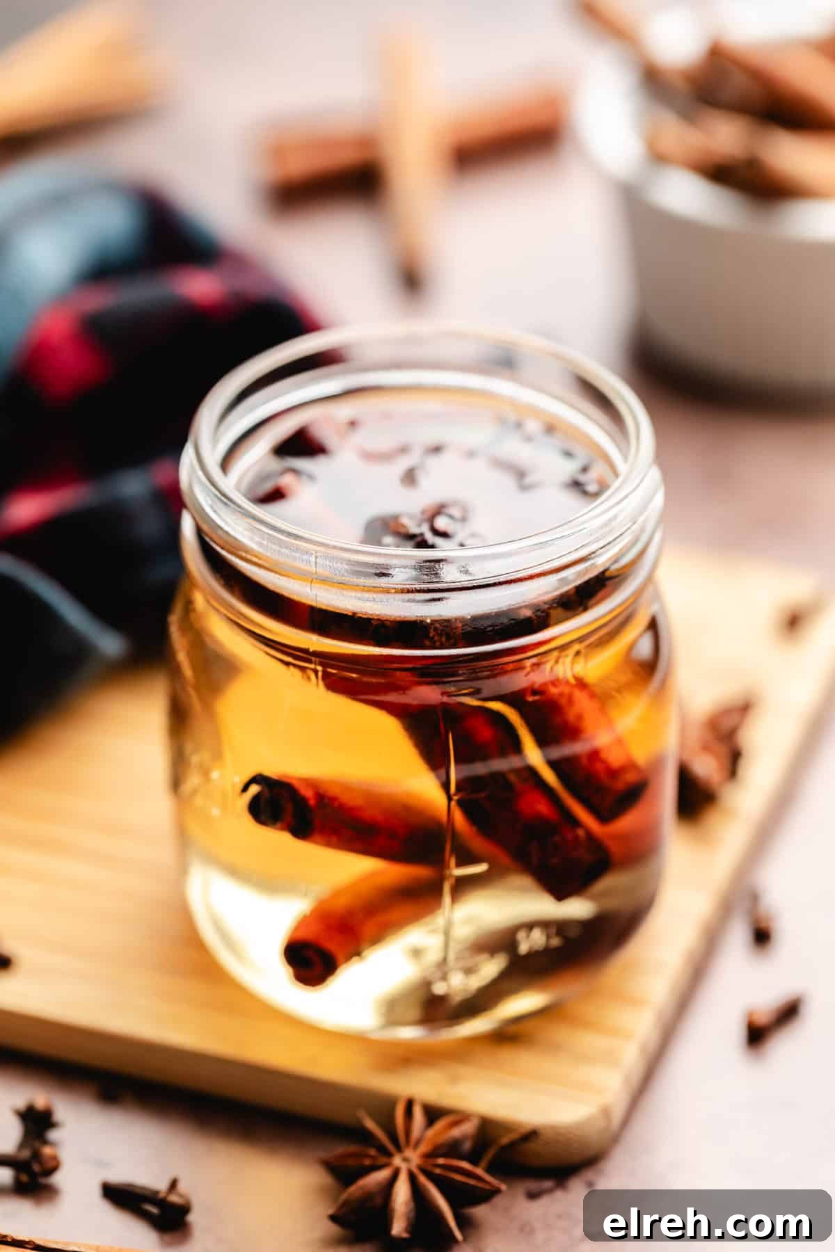 Jar of homemade spiced simple syrup.