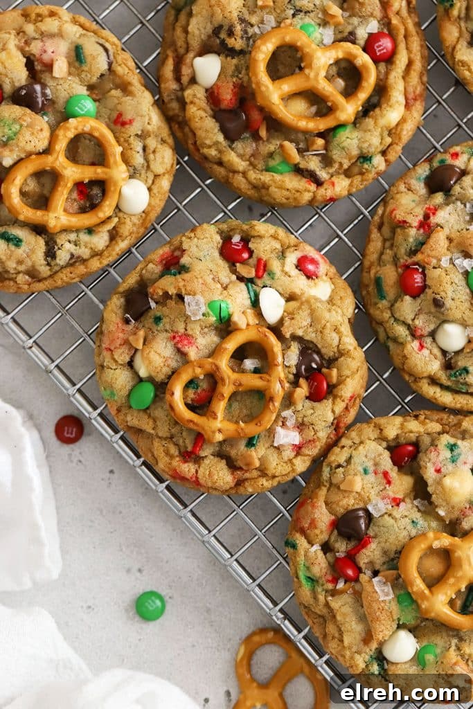 Chewy Gluten-Free Hot Chocolate Cookies Recipe 8 freshly baked gluten-free Christmas kitchen sink cookies on a cooling rack