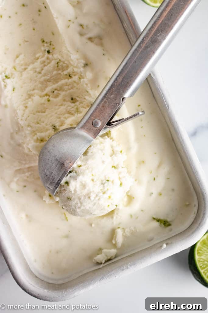 Top down view of lime ice cream in a pan.