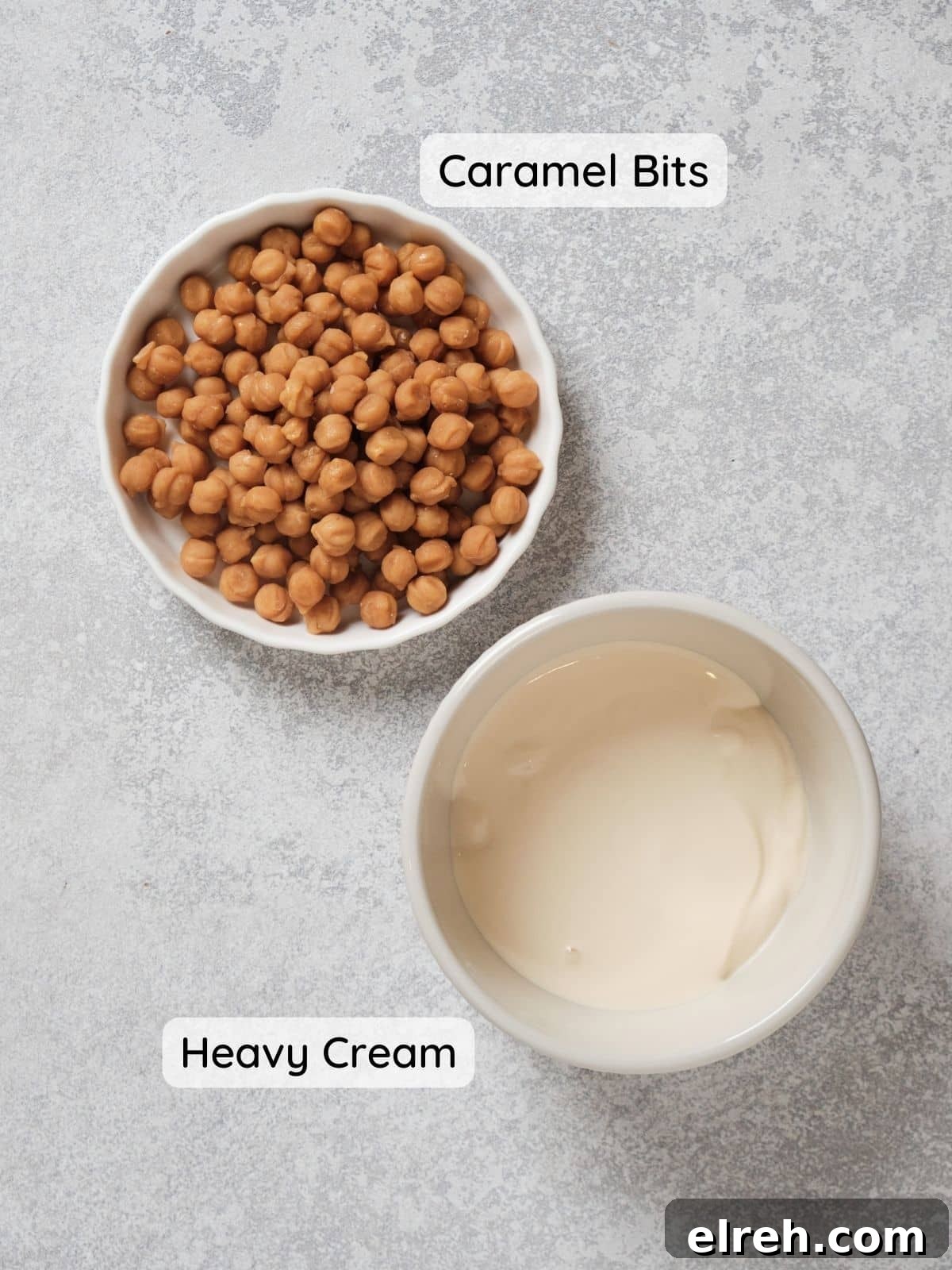 Caramel Cupcake Filling Ingredients on a table with the text "caramel bits" and "heavy cream:"