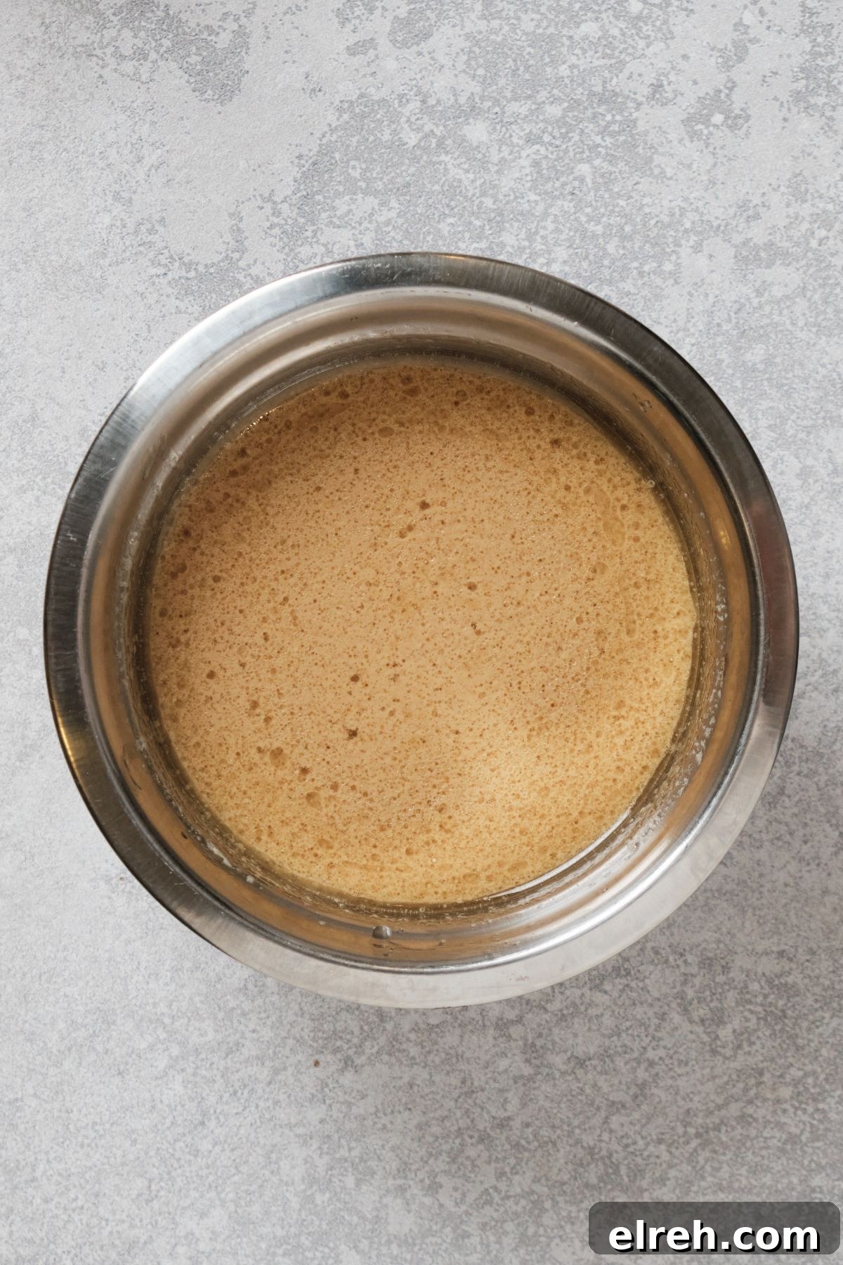 The cupcake wet ingredients in a bowl.